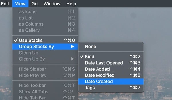 صورة لـ كيفية تمكين Stacks على نظام التشغيل MacOS لجعل سطح المكتب أنظف | Stacks-OSX-Group-Options-DzTechs