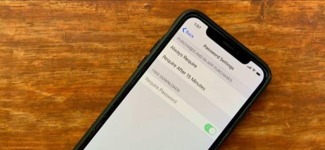 صورة لـ كيفية تعطيل Face ID للمُصادقة على عمليات الشراء في App Store؟ | Password_Settings_screen_for_iTunes_shown_on_iPhone-iJlz3ggs-DzTechs