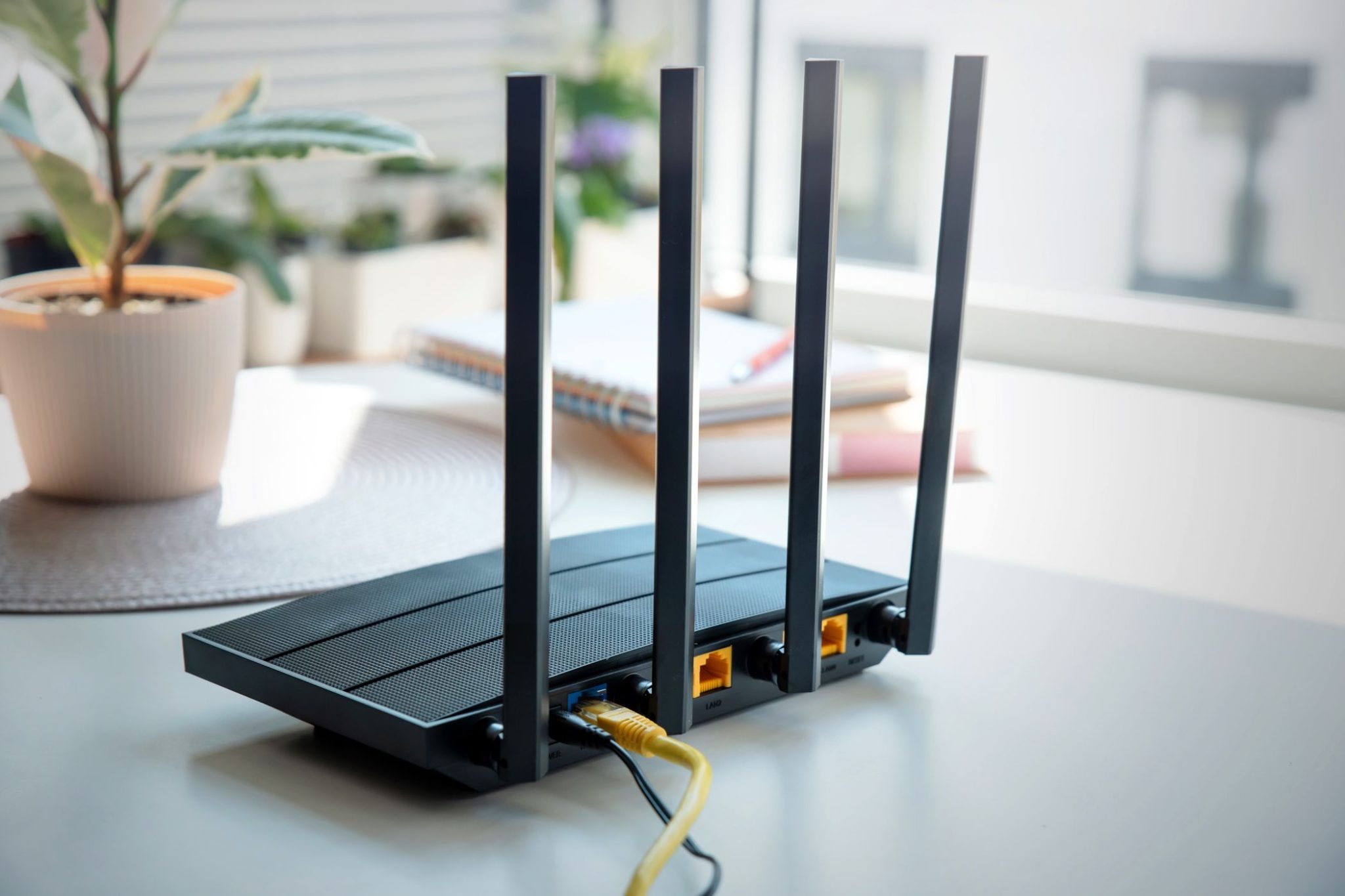 router with four antennas on table